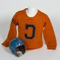 Orange sweater with letter C on front next to blue football helmet.